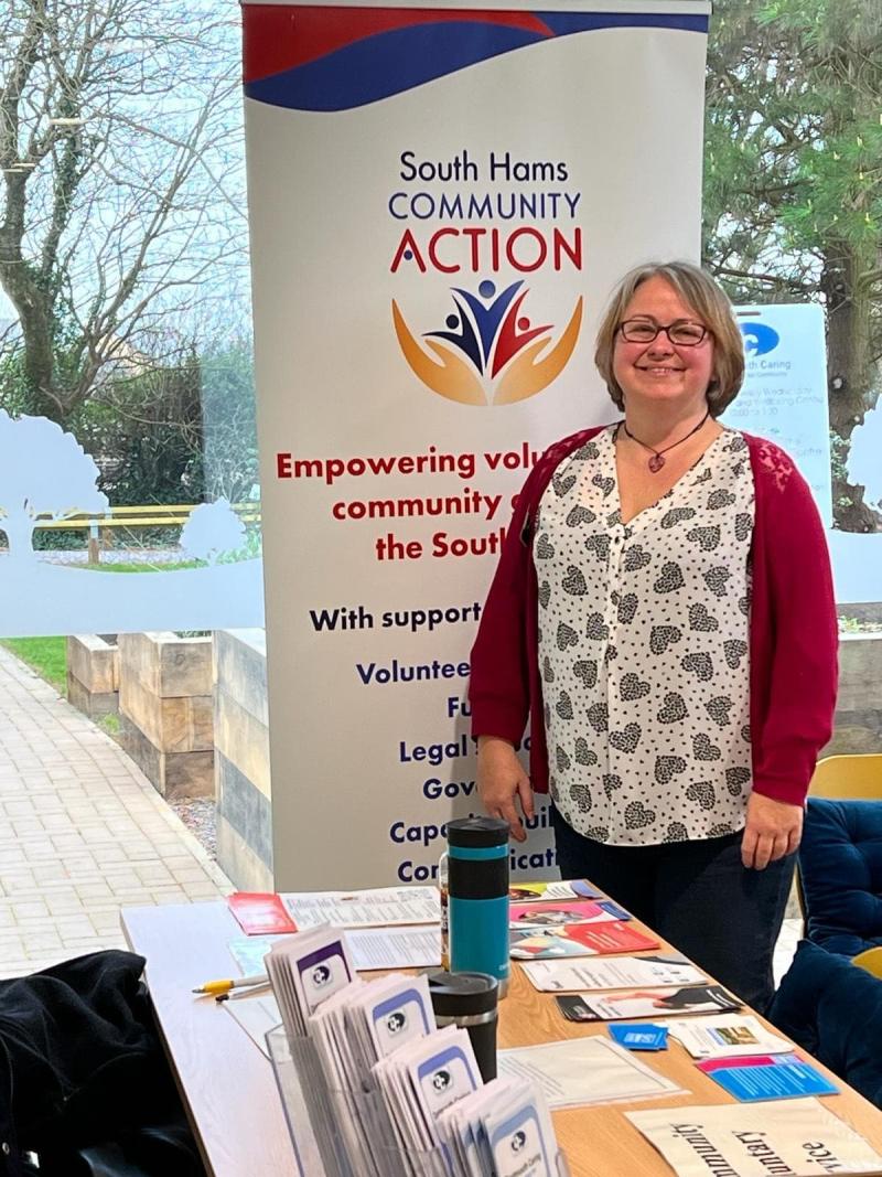 Person at a South Hams Community Action stand